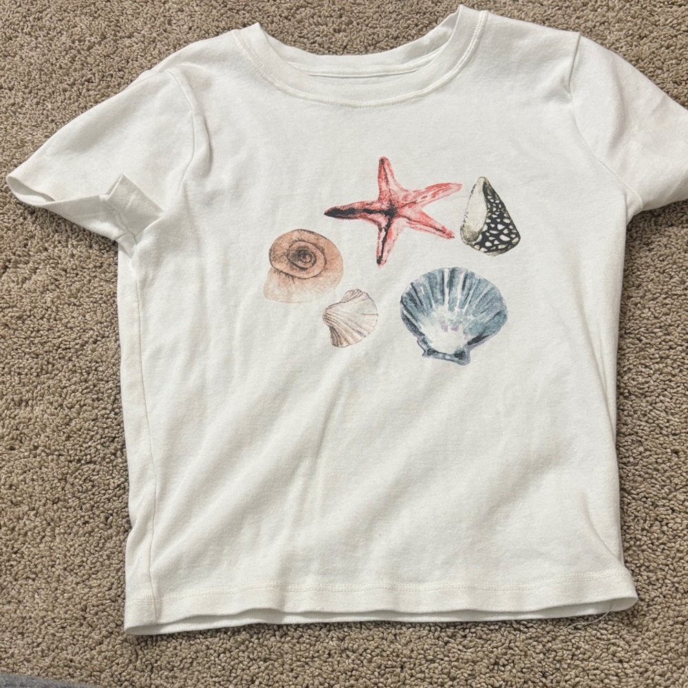 women’s Seashell Graphic baby Tee - White